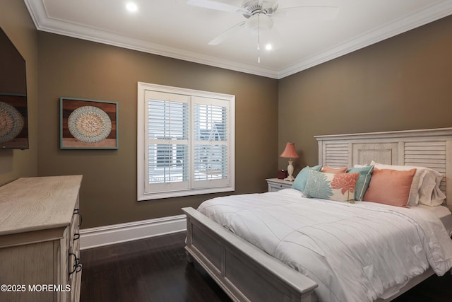 bedroom featuring dark hardwood / wood-style flooring, crown molding, and ceiling fan