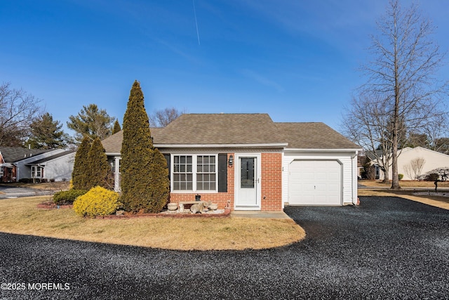 single story home featuring a garage