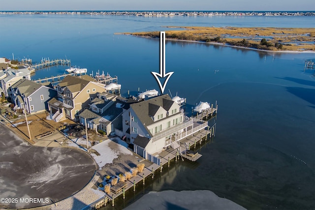 aerial view featuring a water view