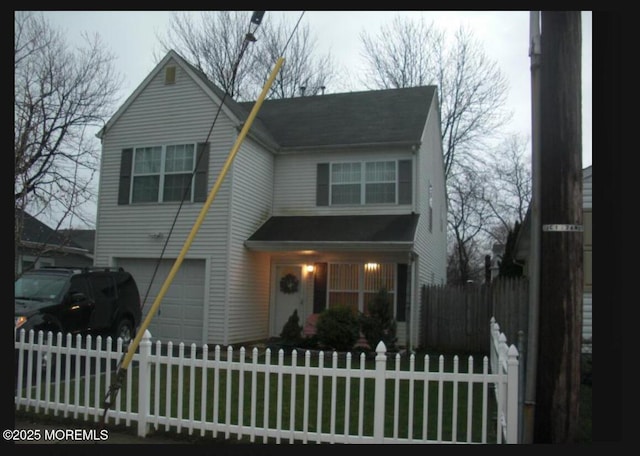 view of property with a garage