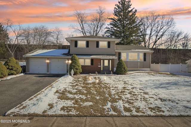 view of front of house with a garage