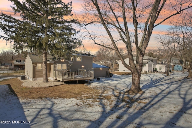 view of front of home with a wooden deck