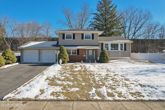 split level home featuring a garage