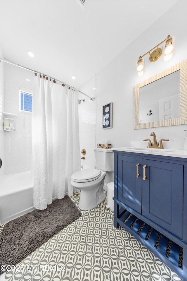 full bathroom with vanity, toilet, and shower / bath combo with shower curtain