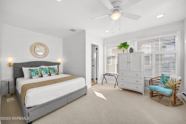 bedroom featuring ceiling fan and light colored carpet