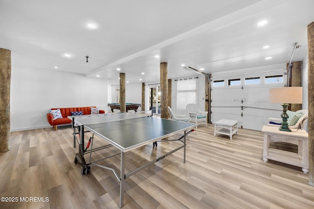 game room featuring light hardwood / wood-style floors