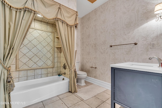 full bathroom featuring tile patterned flooring, toilet, vanity, and shower / bath combo with shower curtain