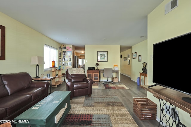 living room featuring dark hardwood / wood-style flooring