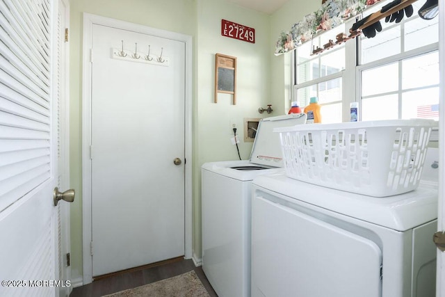 laundry area featuring washing machine and clothes dryer