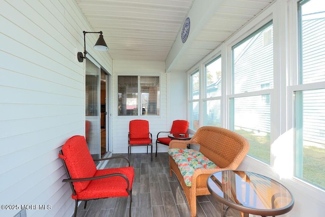 sunroom / solarium featuring a wealth of natural light