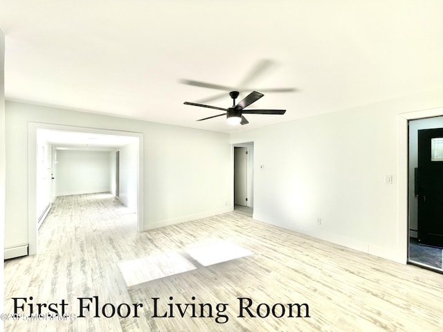 empty room with ceiling fan, baseboard heating, and light hardwood / wood-style flooring