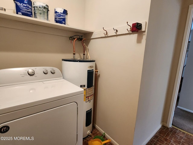 clothes washing area featuring washer / clothes dryer and water heater