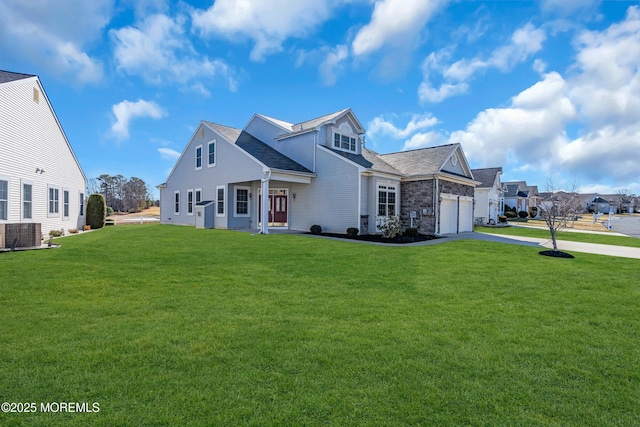 view of front of home with a front lawn and central air condition unit