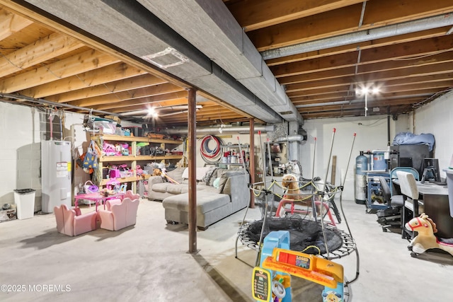 basement featuring electric water heater