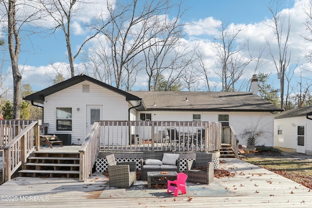 back of house featuring an outdoor hangout area and a deck