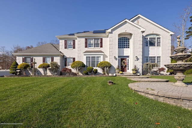 view of front of home with a front yard