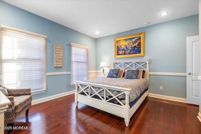 bedroom featuring dark wood-type flooring