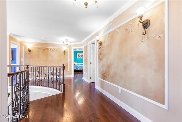 hallway featuring dark hardwood / wood-style flooring and crown molding