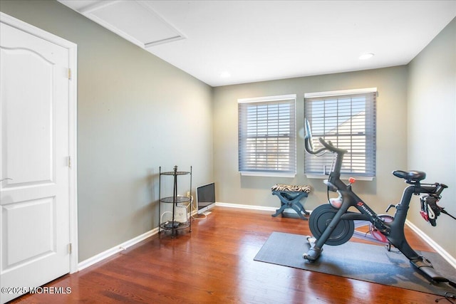 exercise area with dark hardwood / wood-style floors