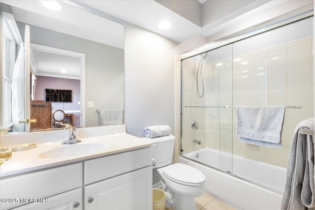 full bathroom with vanity, tile patterned flooring, enclosed tub / shower combo, and toilet