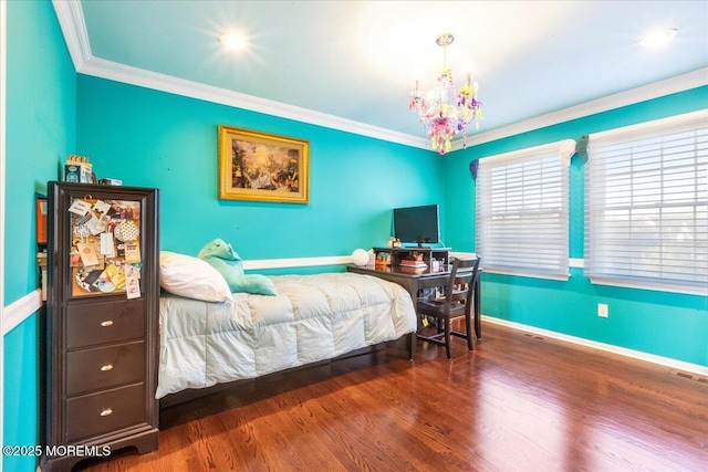 bedroom with a notable chandelier, crown molding, and dark wood-type flooring