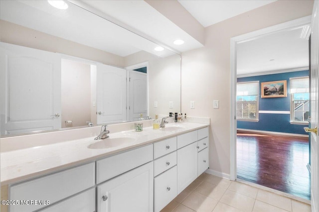 bathroom with vanity and tile patterned flooring