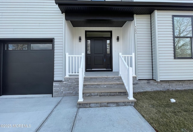 entrance to property with a garage