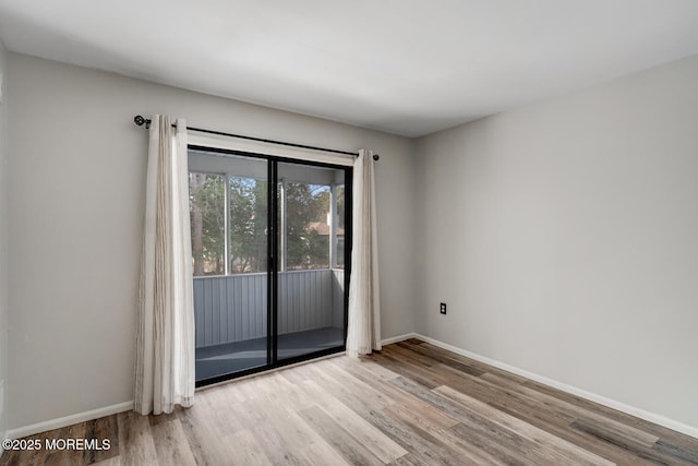 empty room featuring light wood-type flooring