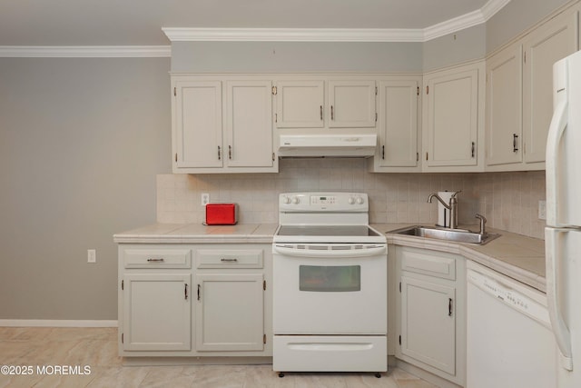 kitchen with sink, crown molding, white appliances, tasteful backsplash, and white cabinets