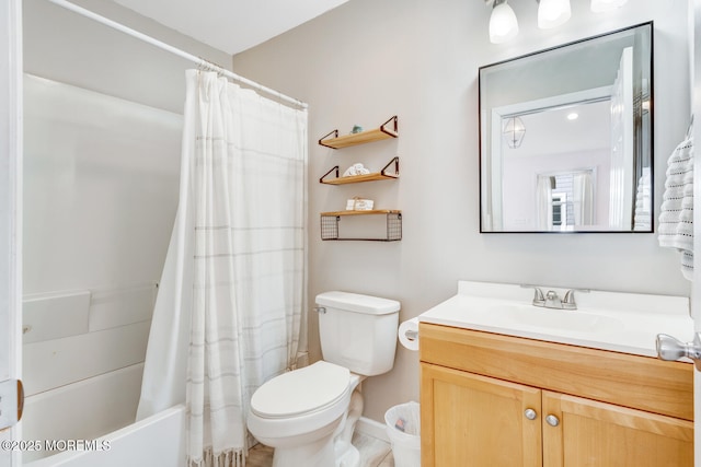 full bathroom with vanity, toilet, and shower / tub combo