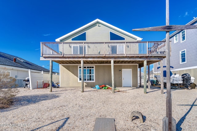 back of property featuring a deck