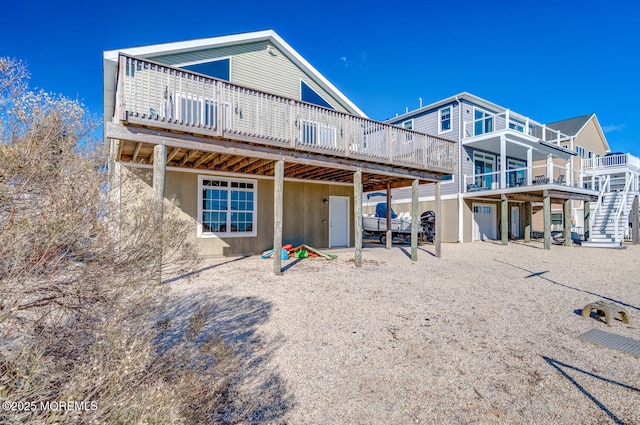 rear view of property with a deck