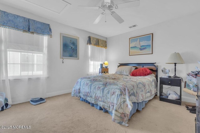 bedroom with ceiling fan and carpet floors