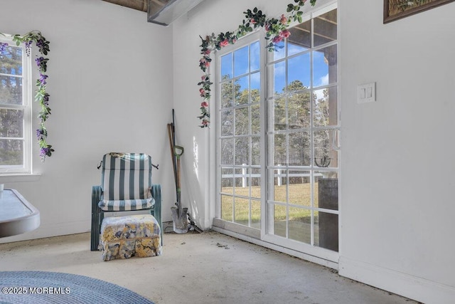 unfurnished room featuring concrete flooring