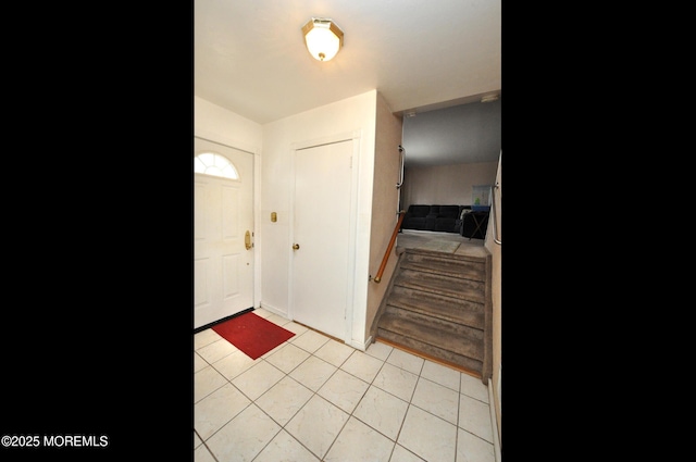 foyer with light tile patterned floors