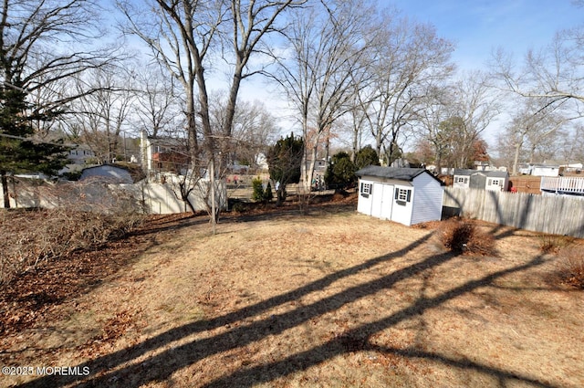 view of yard with a storage shed