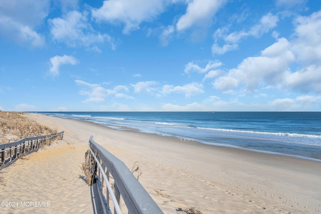 property view of water featuring a view of the beach