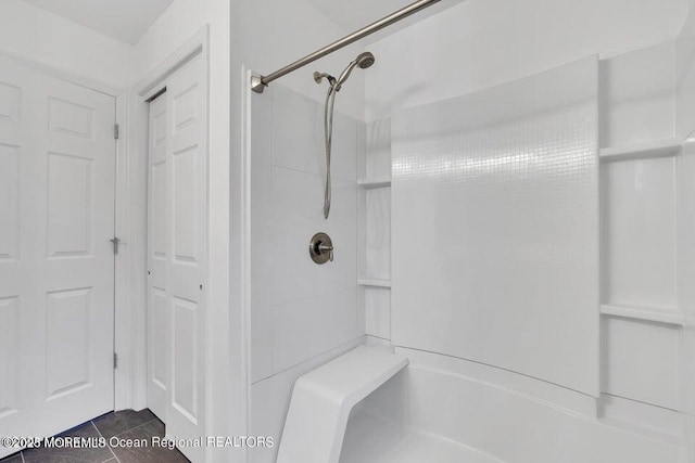 bathroom featuring tile patterned flooring