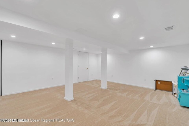 basement with light carpet