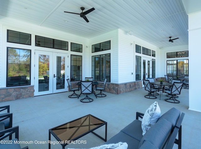 view of patio with outdoor lounge area, ceiling fan, and french doors