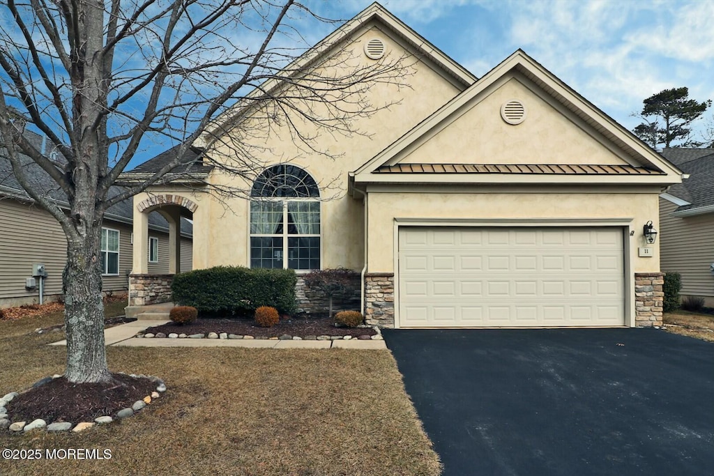 11 Vineyard Way, Barnegat, NJ 08005 - view of front facade featuring a garage