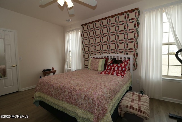 bedroom featuring wood-type flooring and ceiling fan