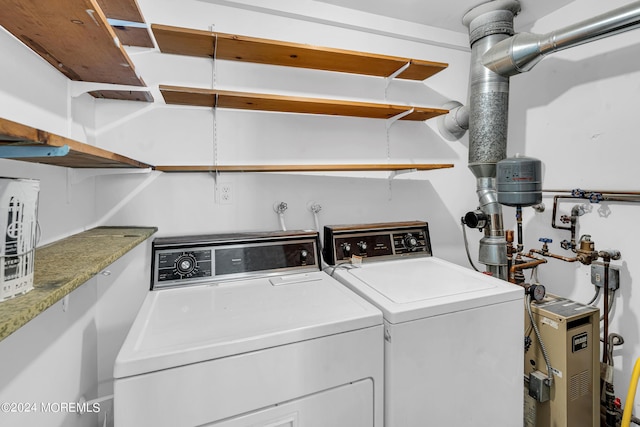 laundry room featuring washer and clothes dryer