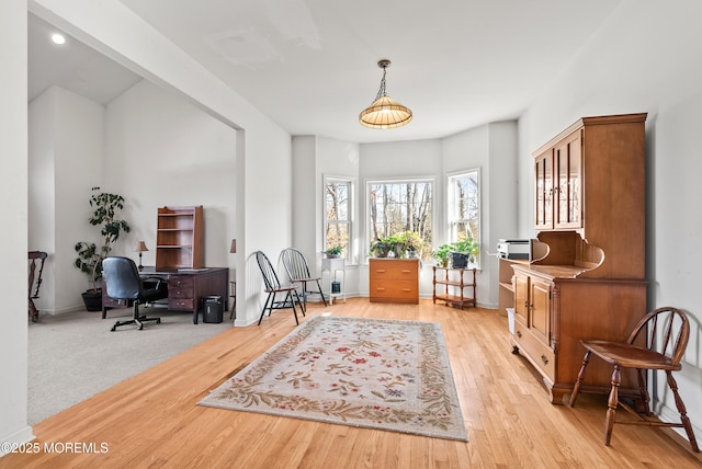 sitting room featuring light hardwood / wood-style flooring