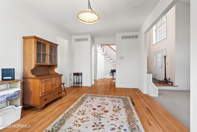 interior space with hardwood / wood-style flooring