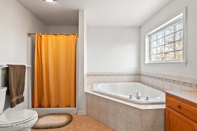 full bathroom with tile patterned floors, toilet, independent shower and bath, and vanity