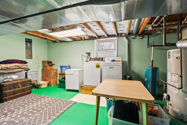 basement featuring gas water heater and washer and dryer