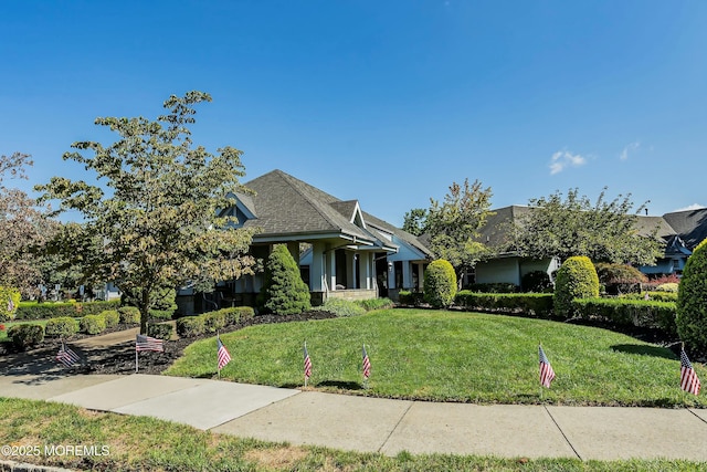 view of front of home with a front yard