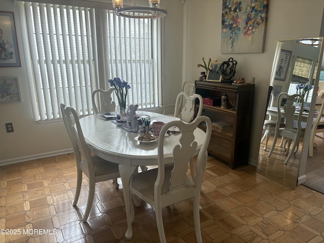 dining room featuring a chandelier