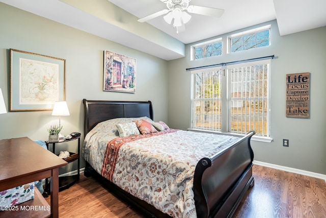 bedroom featuring wood-type flooring and ceiling fan